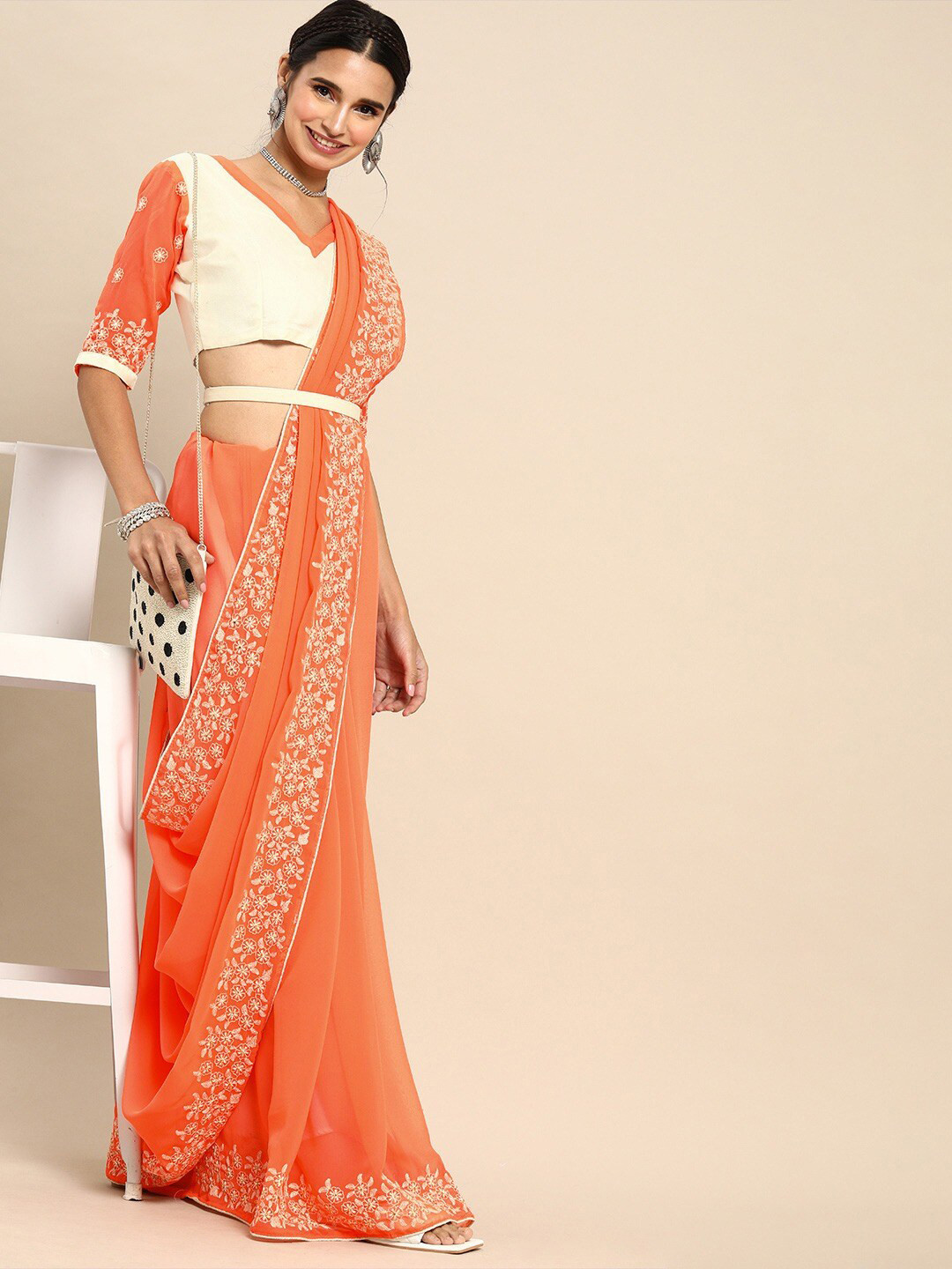 

Sangria Women Pure Georgette Peach Sarees