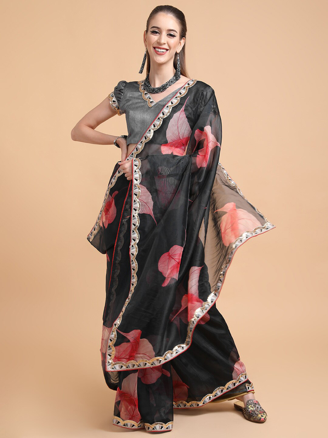 

Sangria Women Black Sarees