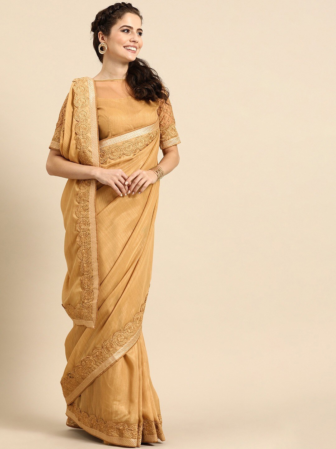 

Sangria Women Gold Sarees