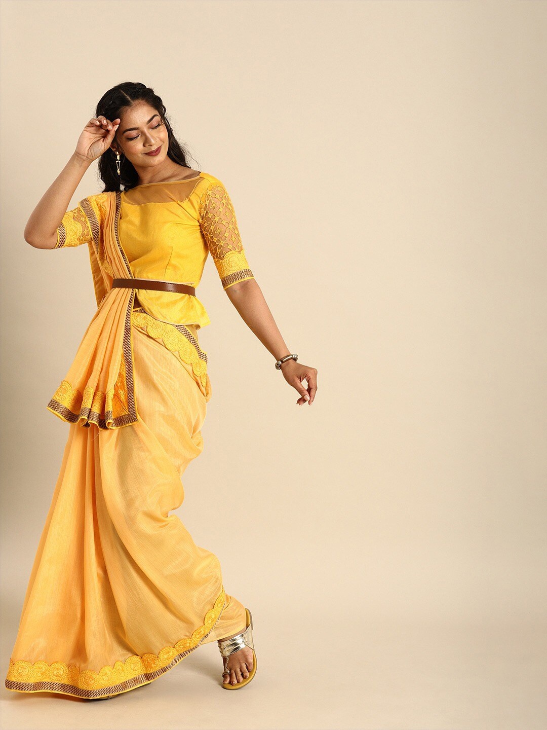 

Sangria Women Yellow Embroidered Batik Work Sarees