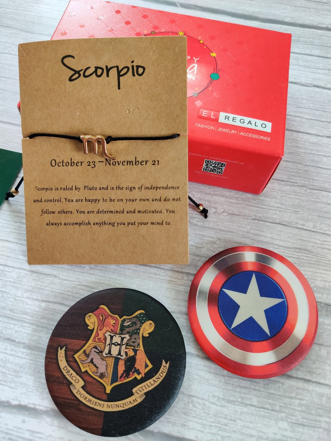 

EL REGALO Scorpio Zodiac Rakhi With Captain America & Harry Potter Badge Combo, Silver