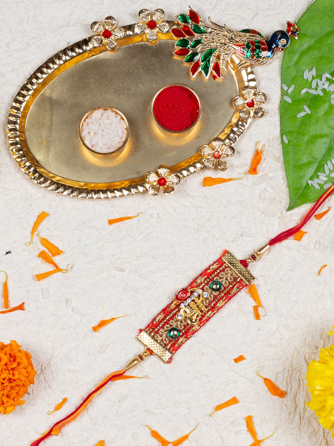 

Accessher Gift Set of 3 with Religious Sri Inscribed Rakhi, Peacock Thali & Greeting Card, Multi