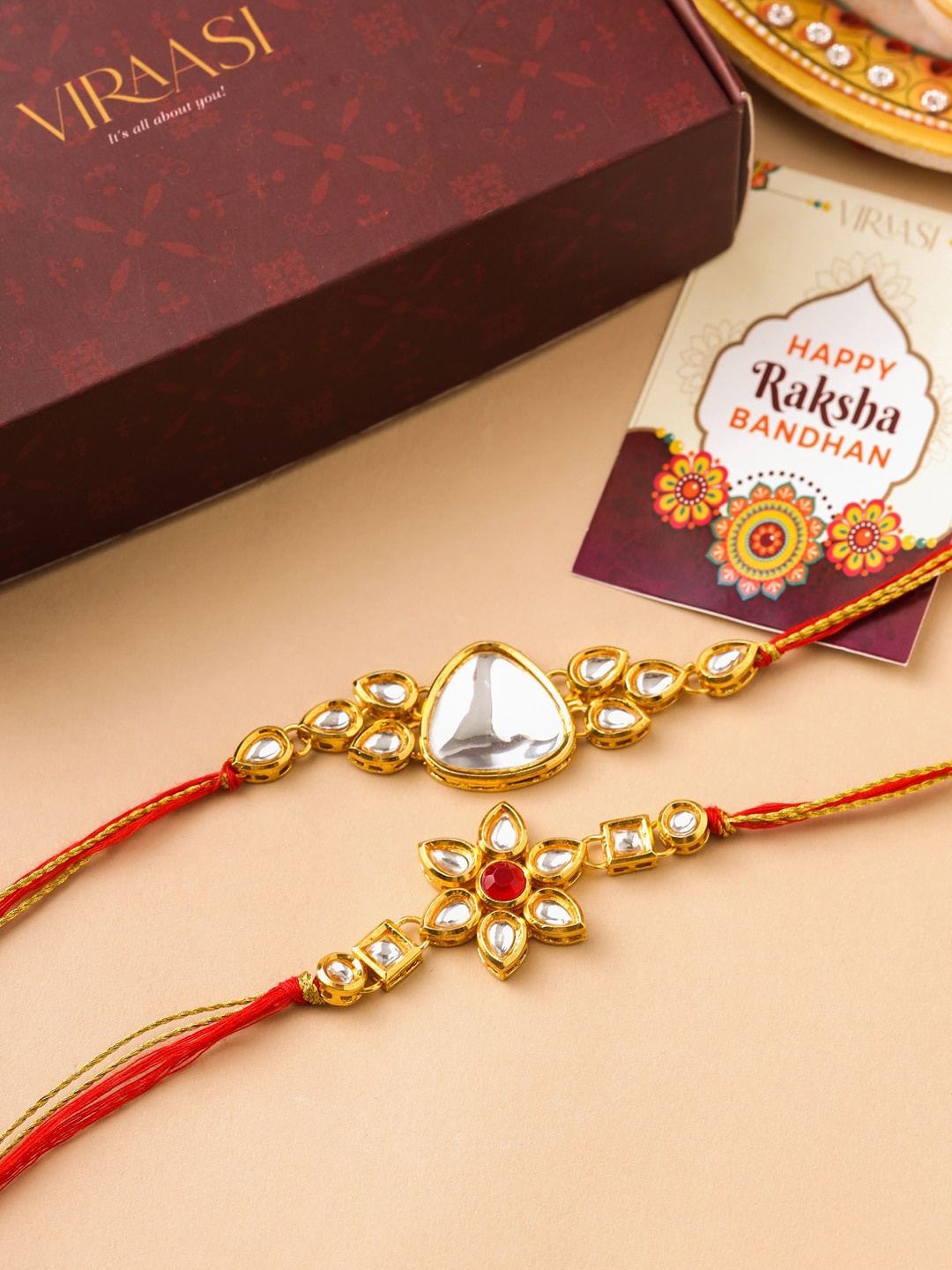 

VIRAASI Men Set Of 2 Red & Gold-Toned Kundan-Studded Rakhi
