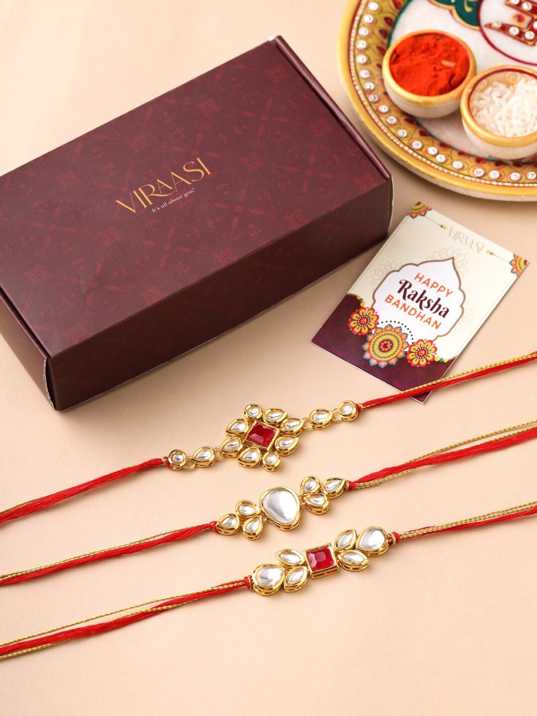 

VIRAASI Men Set Of 3 Red & Gold-Toned Kundan Stone-Studded Rakhi