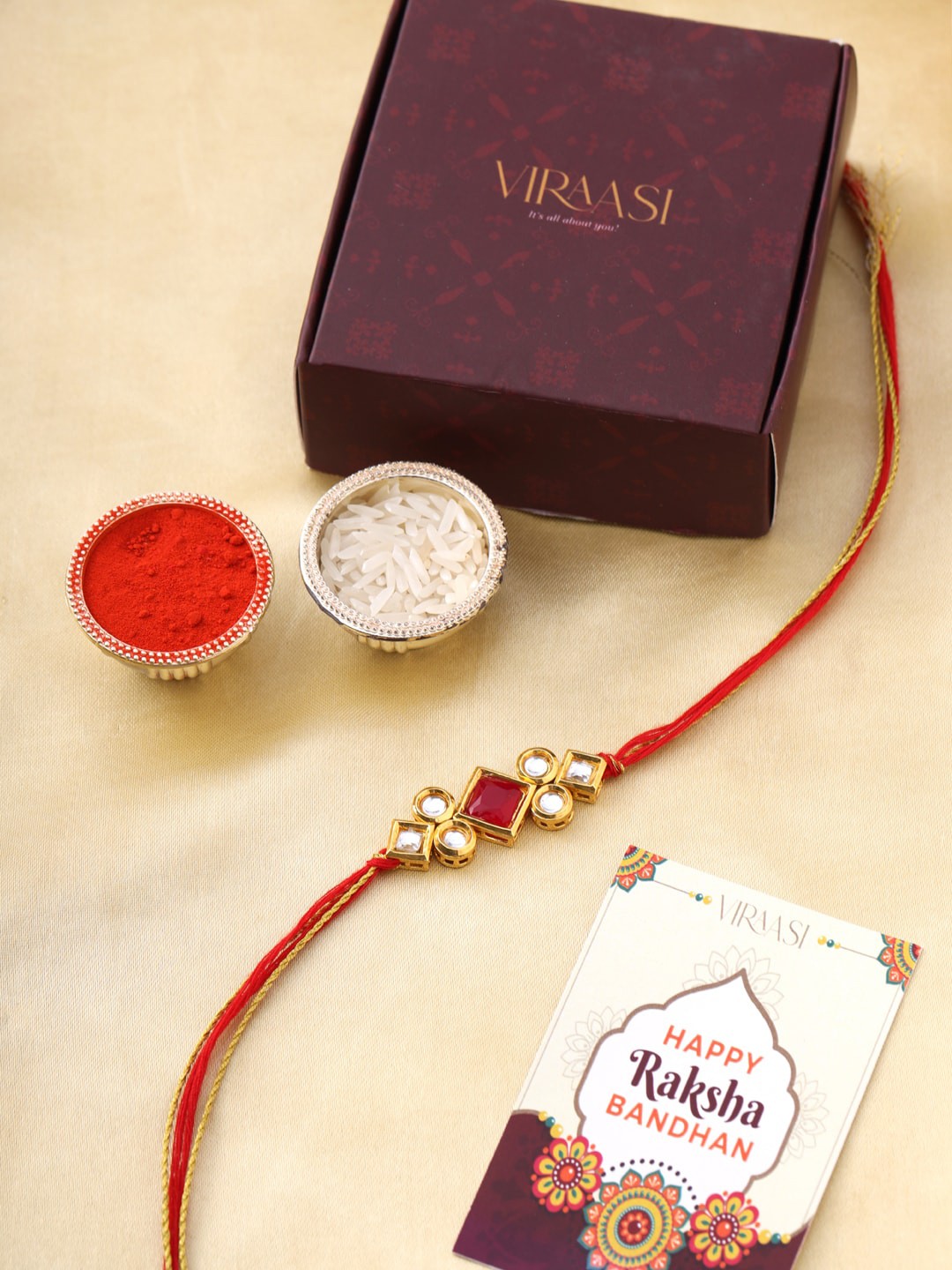 

VIRAASI Men Gold Toned & Red Beaded Rakhi