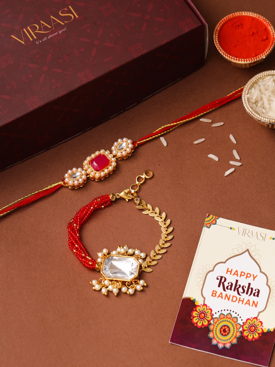 

VIRAASI Unisex Set Of 2 Gold-Toned Kundan Studded Rakhi With Roli Chawal