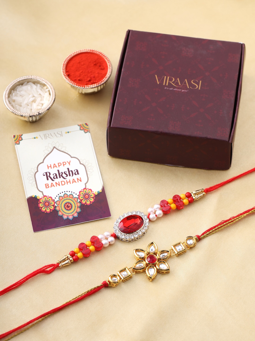 

VIRAASI Men Set Of 2 Gold-Toned & Red Stone-Studded Rakhi With Roli Chawal