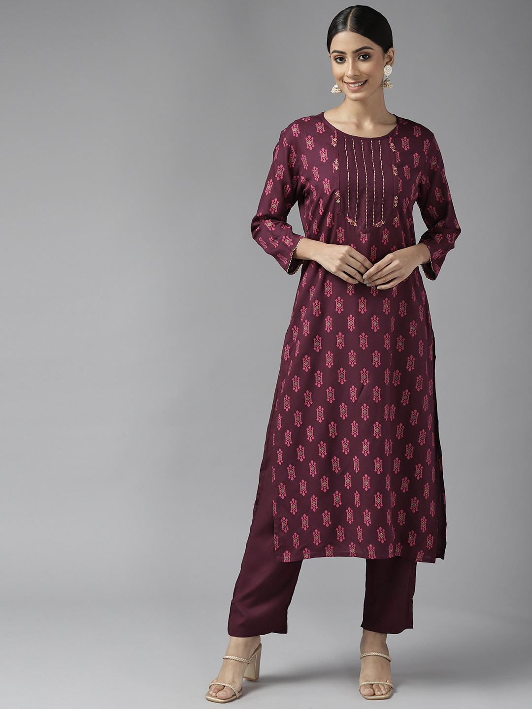 

Yufta Women Burgundy Ethnic Motifs Printed Mirror Work Kurta with Trousers