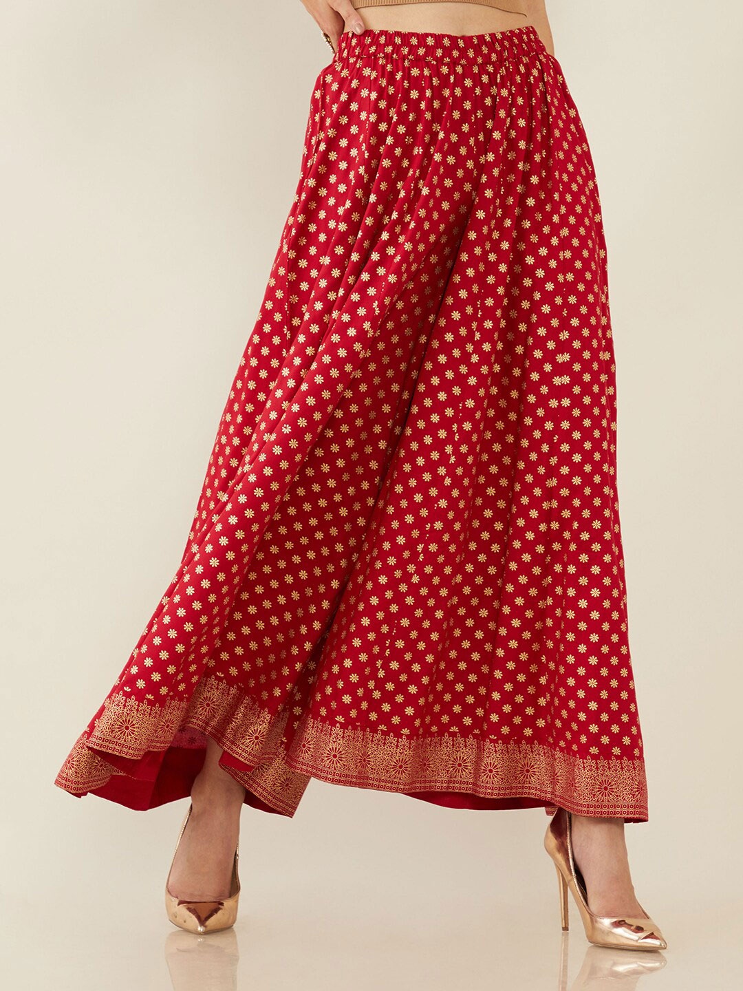

Soch Women Red & Gold-Toned Floral Printed Flared Knitted Ethnic Palazzos