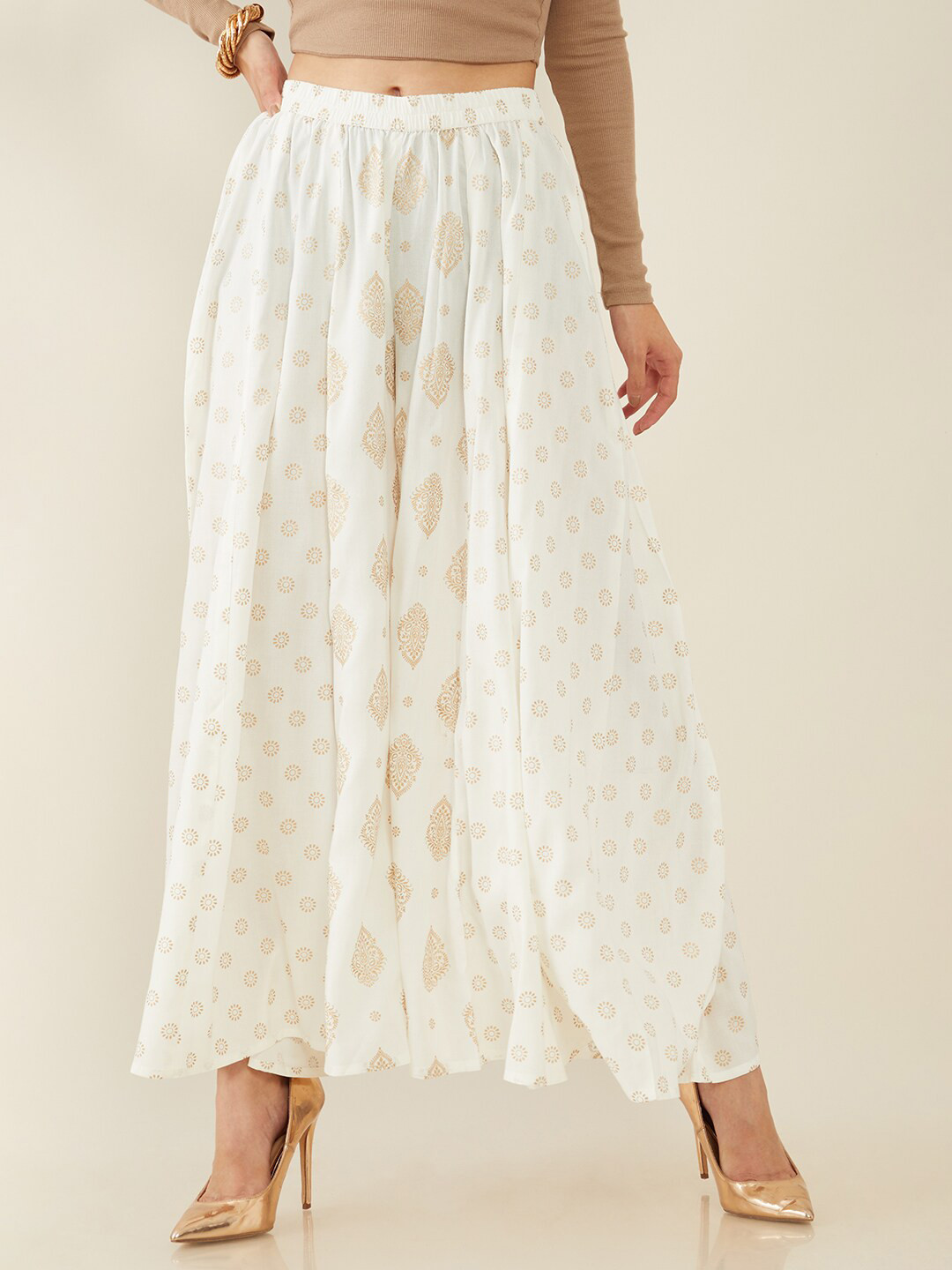 

Soch Women Off White & Gold-Toned Printed Flared Knitted Ethnic Palazzos
