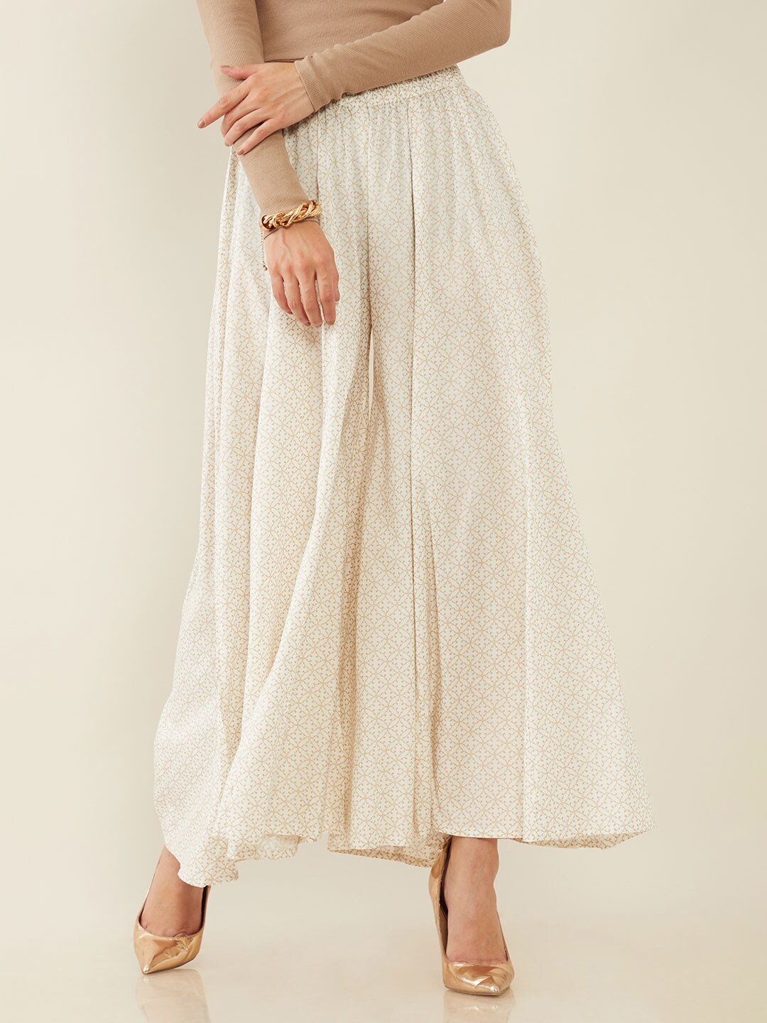 

Soch Women Off White Printed Flared Knitted Ethnic Palazzos