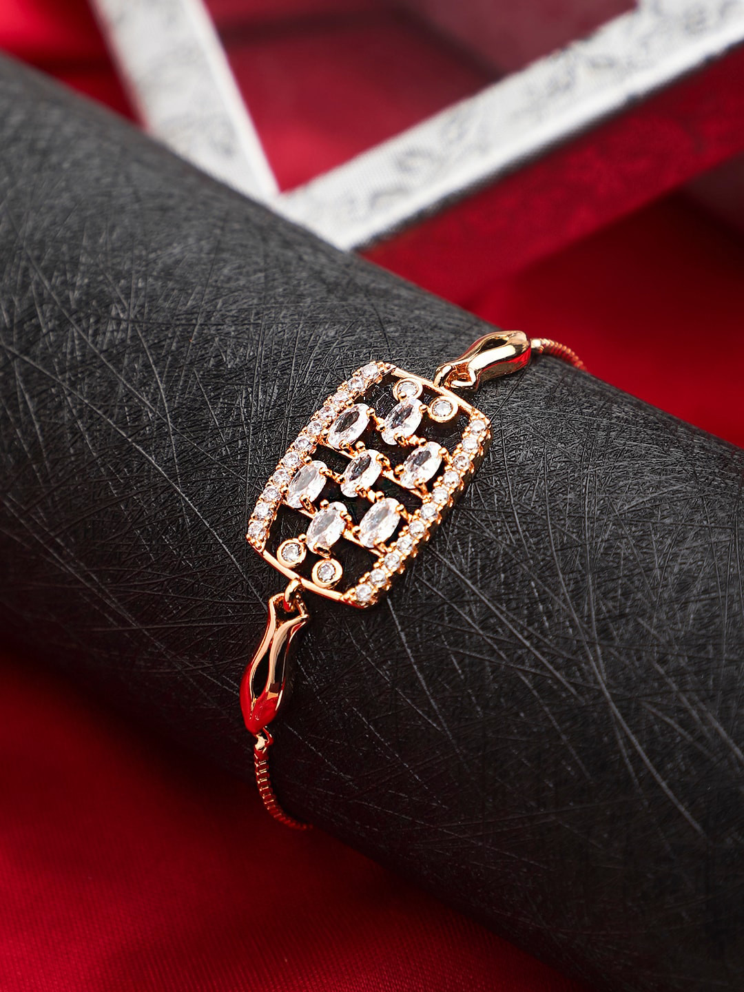 

Mali Fionna Women Gold-Plated & White Artificial Stone Studded Wraparound Bracelet