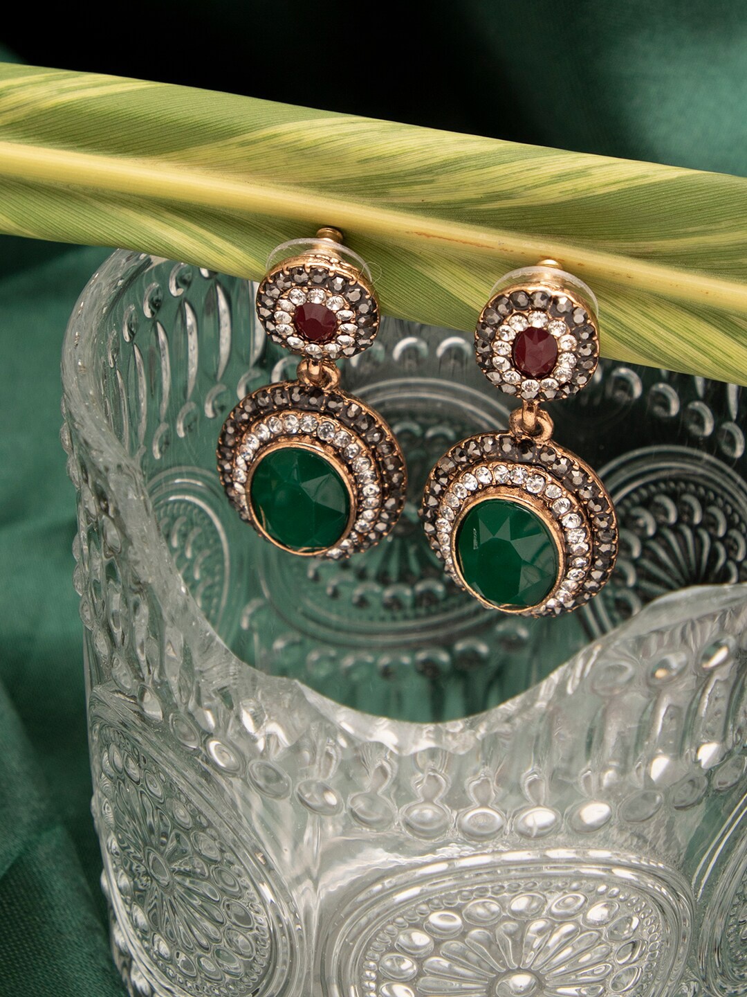 

SOHI Women Green & Maroon Designer Stone Contemporary Drop Earrings
