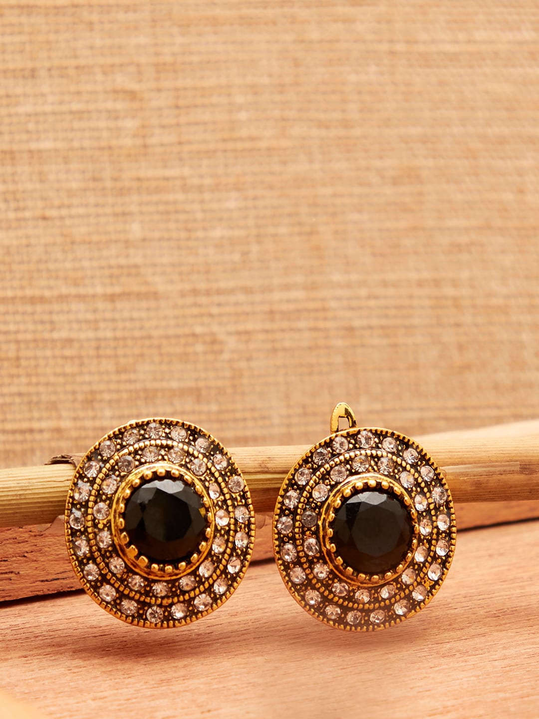 

SOHI Black Contemporary Studs Earrings