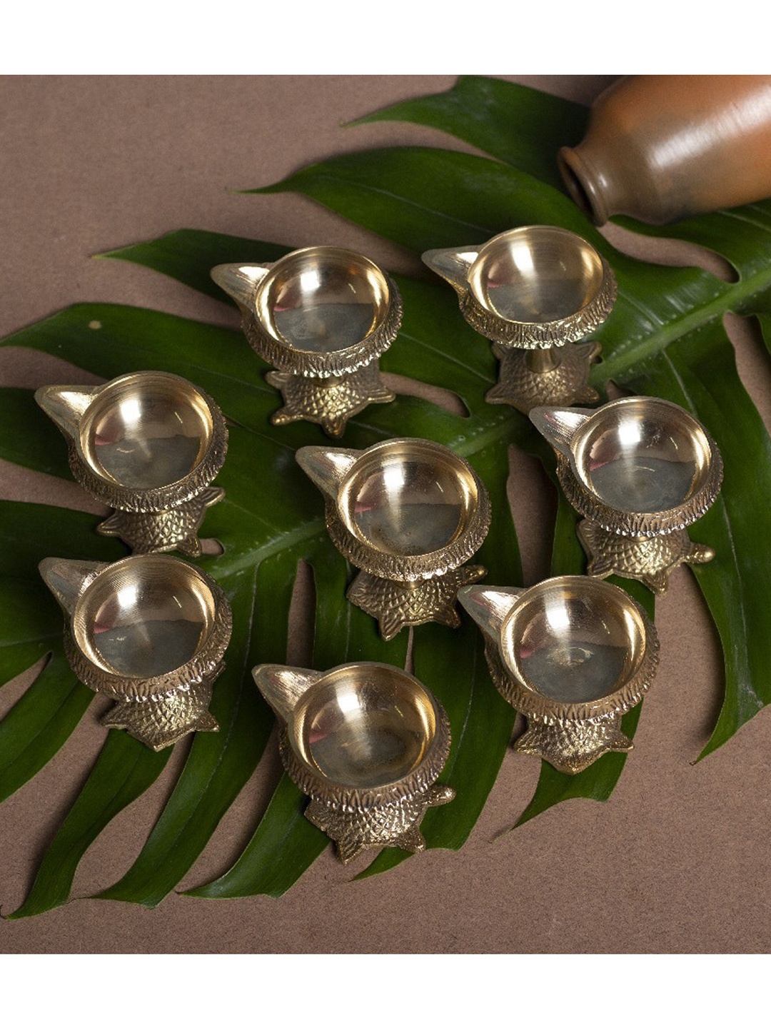 

Fashion Bizz Set Of 8 Gold-Toned Kachua Diyas