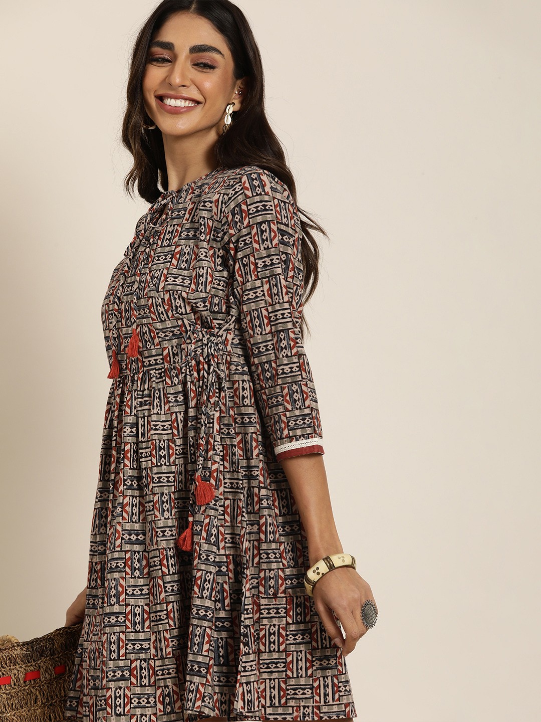 

Taavi Beige & Red Kalmakari Printed Pure Cotton Fit And Flare Dress