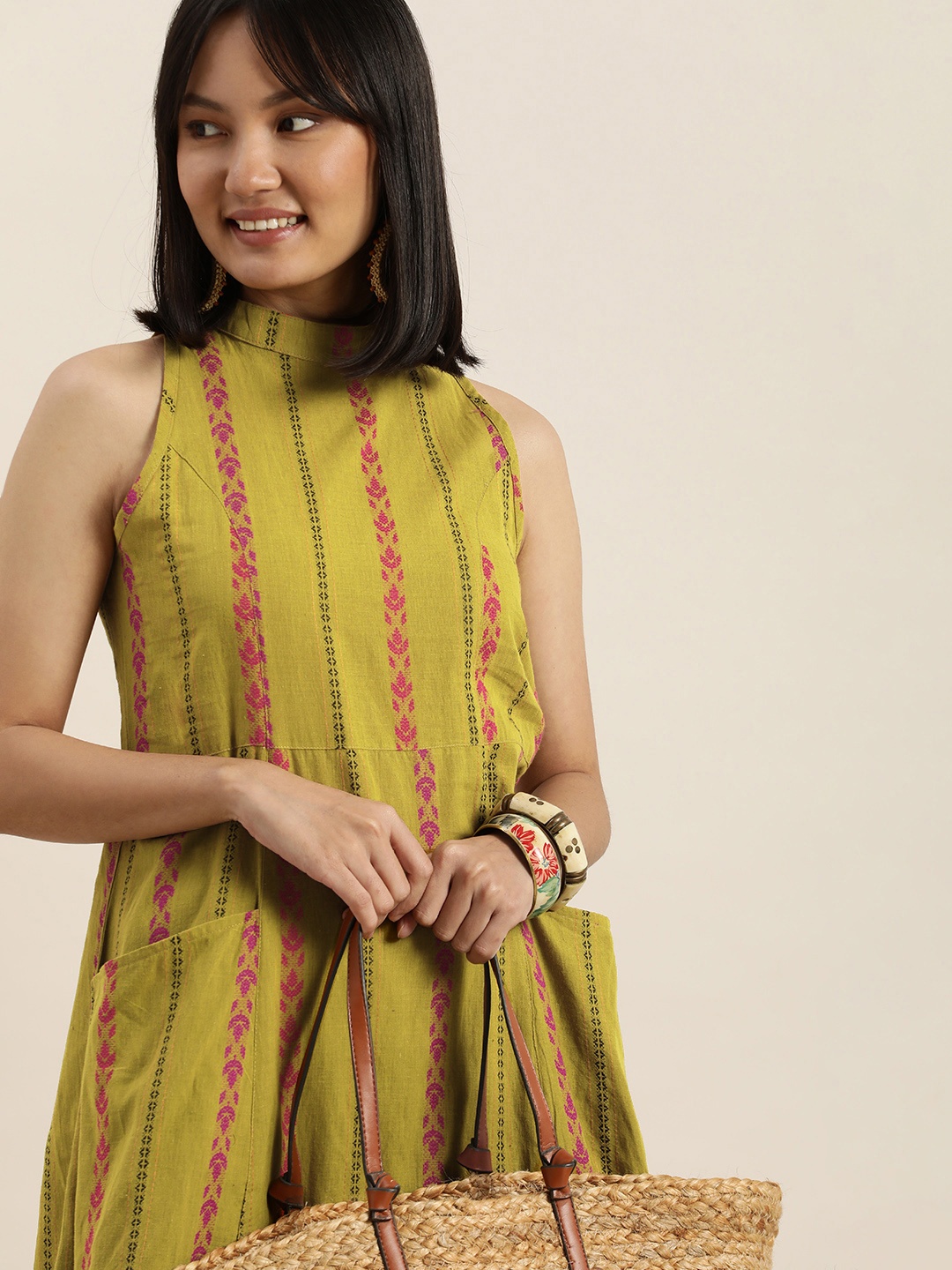 

Taavi Women Olive Green Embroidered Angrakha Mirror Work Kurta with Skirt