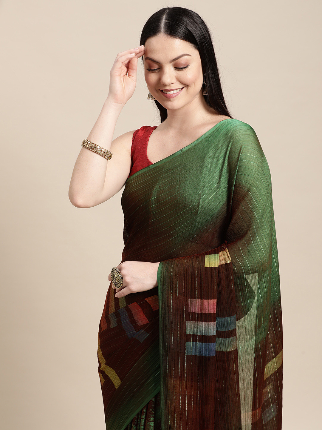

Shaily Green & Coffee Brown Zari Pure Chiffon Saree