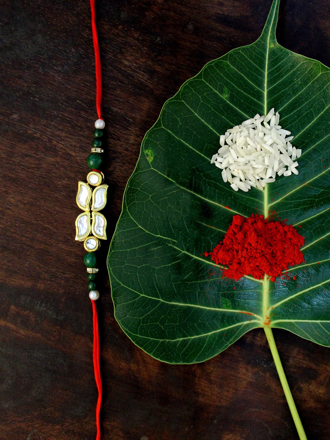 

KARATCART Men Gold-Plated White & Green Kundan-Studded & Beaded Rakhi
