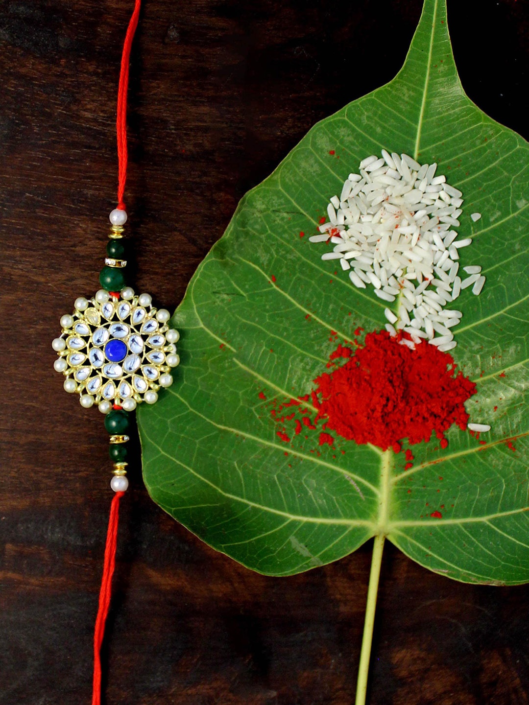 

KARATCART Men Gold-Plated White & Green Kundan-Studded & Beaded Rakhi