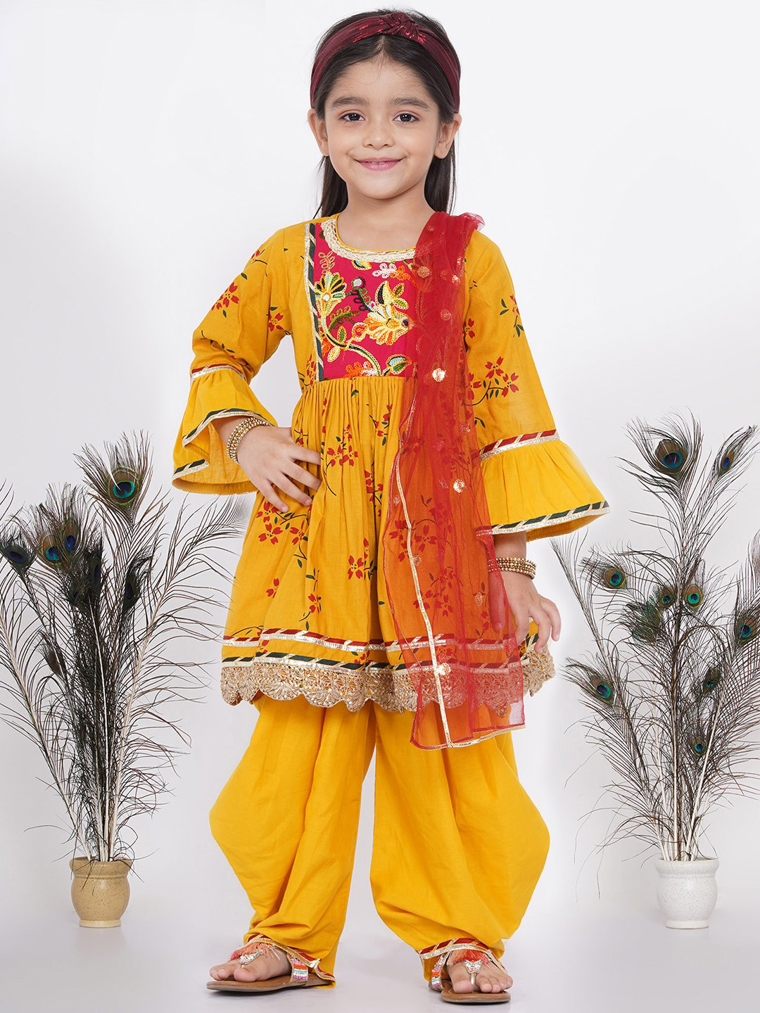

Little Bansi Girls Yellow Floral Printed Pleated Pure Cotton Kurta with Dhoti Pants & With Dupatta
