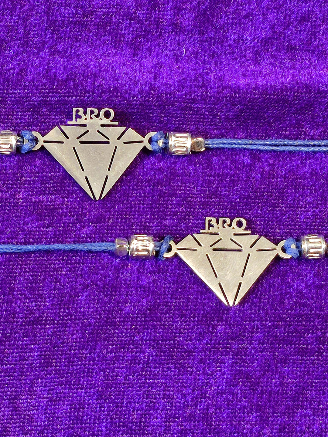 

CRAYTON Men Set Of 2 Silver-Toned & Blue Rakhi
