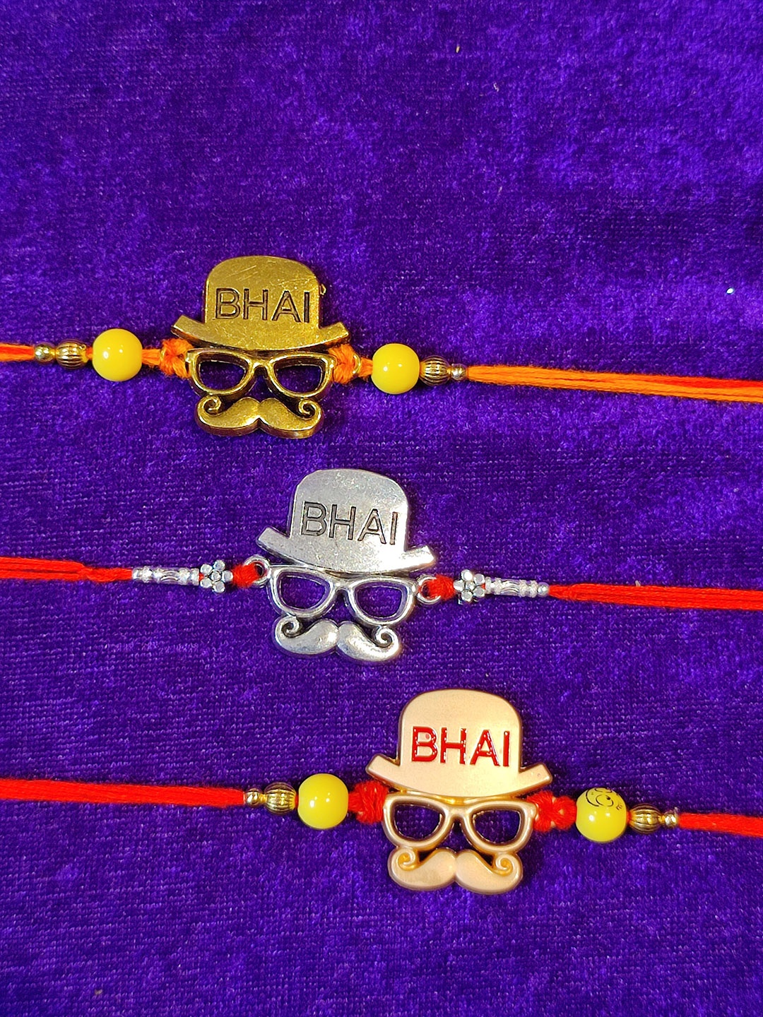 

CRAYTON Men Set Of 3 Red Silver-Toned & Gold-Toned BHAI Embedded Rakhi