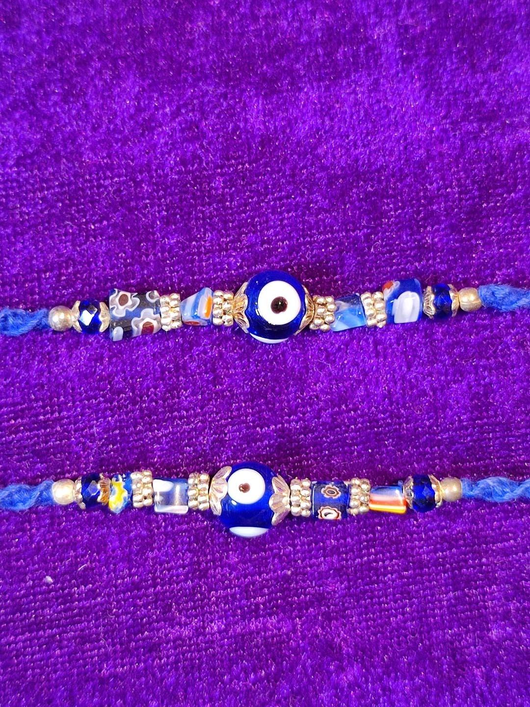 

CRAYTON Men Set Of 2 Blue & White Beaded Evil Eye Rakhi
