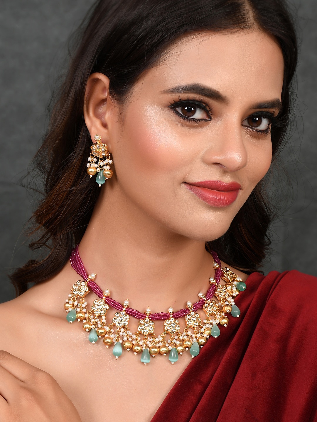

DASTOOR Gold-Plated Blue Stone Studded Jewellery Set