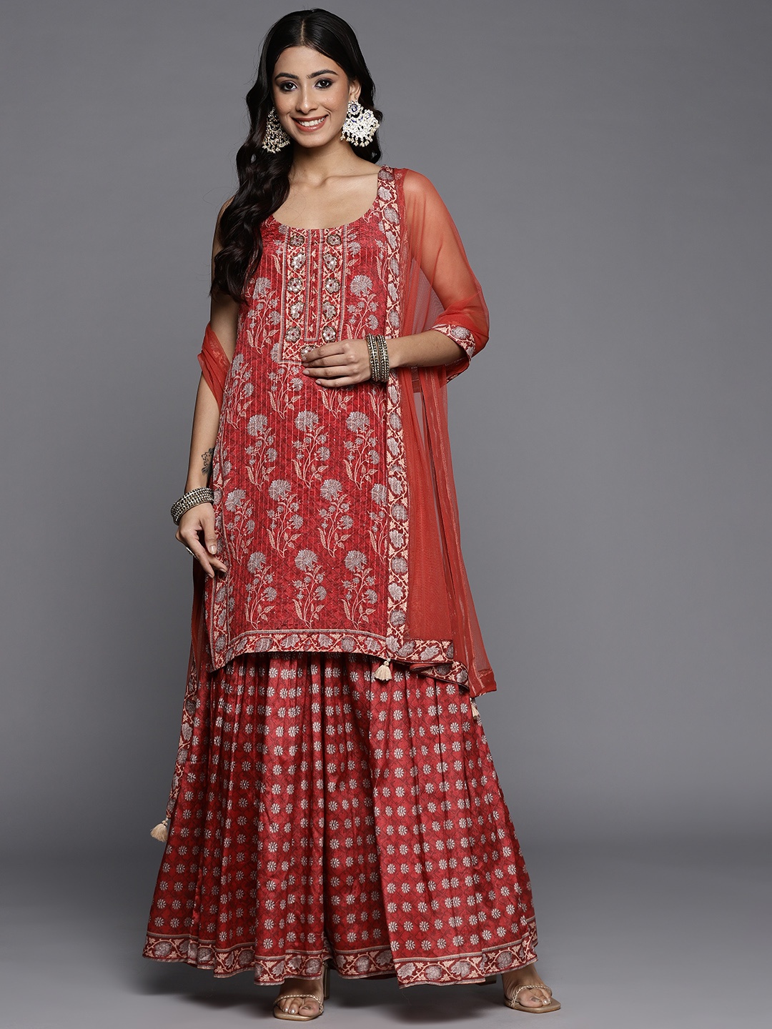 

Varanga Women Red Ethnic Motifs Printed Sequinned Kurta with Sharara & Dupatta