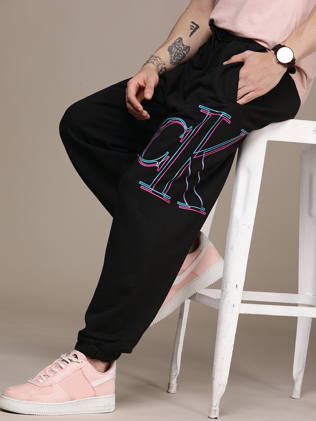 

Calvin Klein Jeans Men Black Brand Logo Printed Relaxed Fit Pure Cotton Regular Joggers