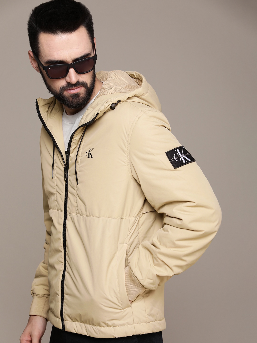 

Calvin Klein Jeans Men Beige Brand Logo Printed Hooded Puffer Jacket