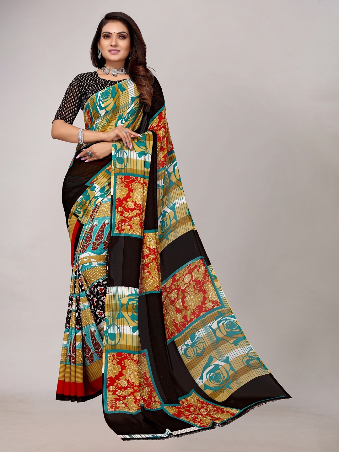 

Yashika Black & Turquoise Blue Floral Saree