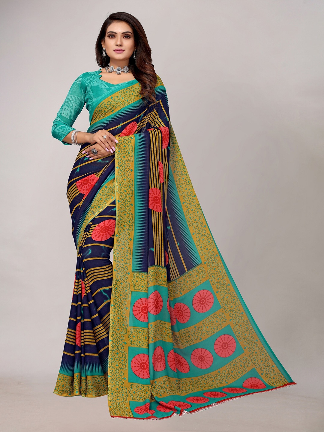 

Yashika Navy Blue & Turquoise Blue Saree