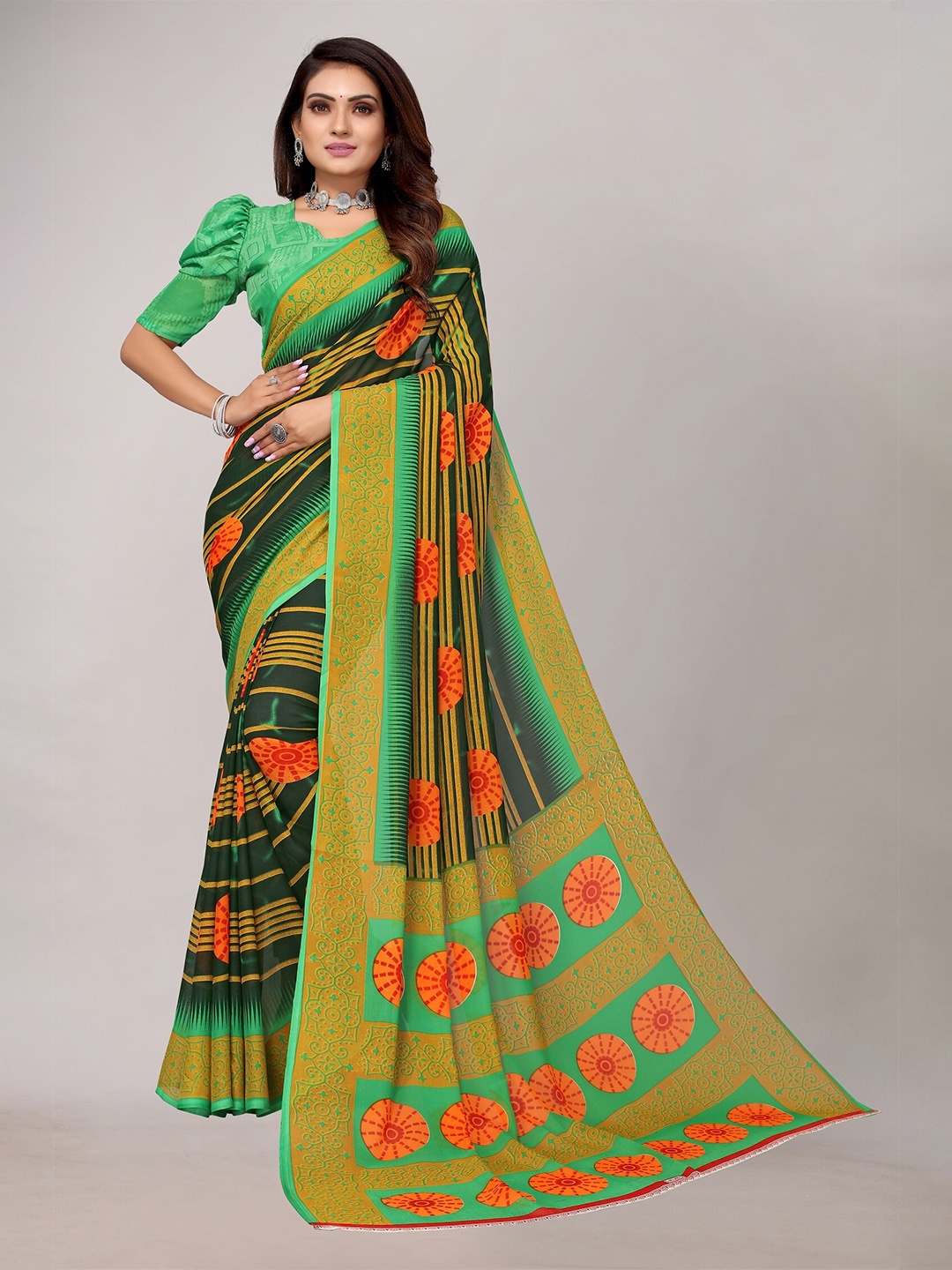 

Yashika Green & Orange Floral Saree