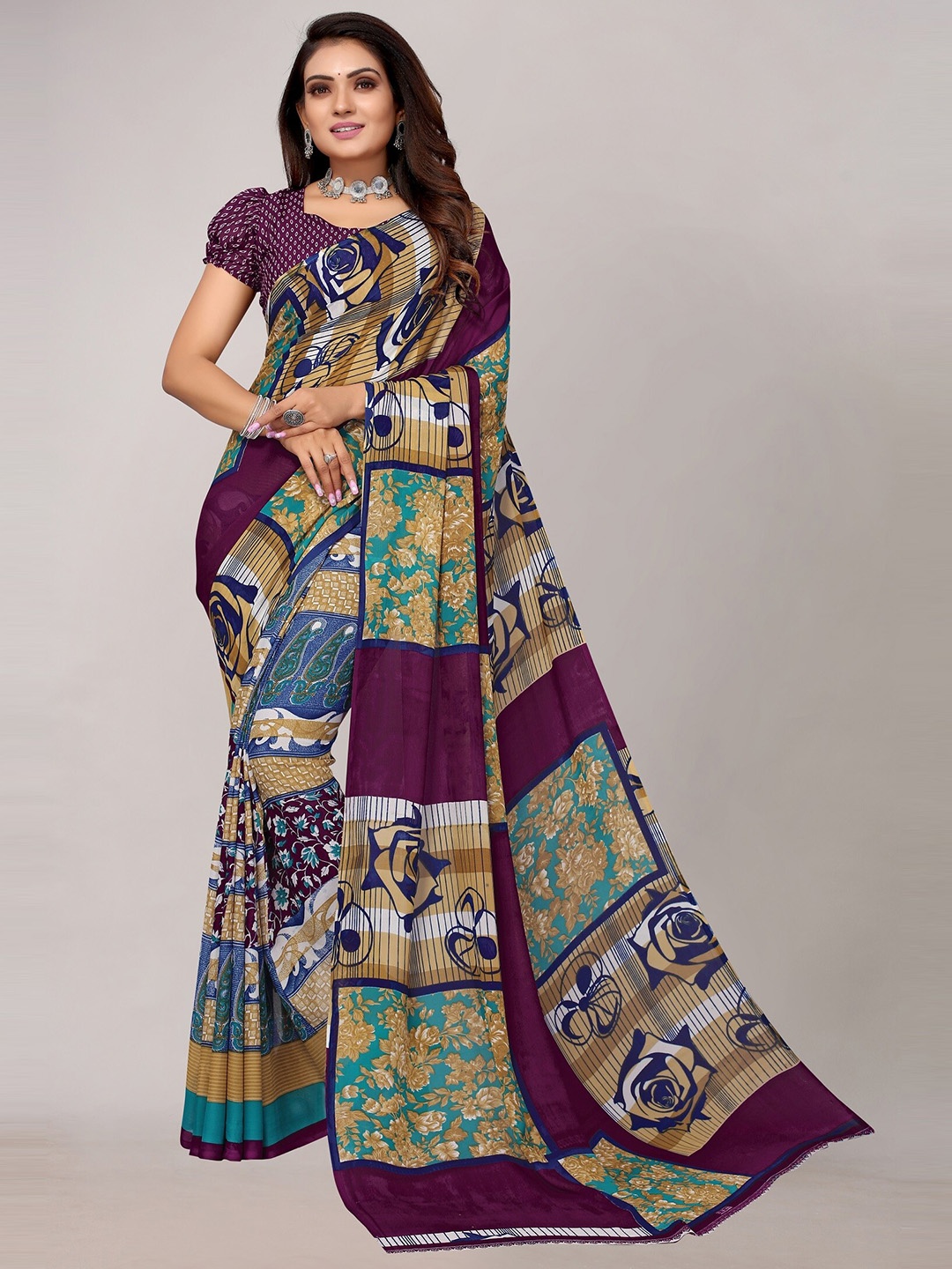 

Yashika Purple & Blue Floral Saree