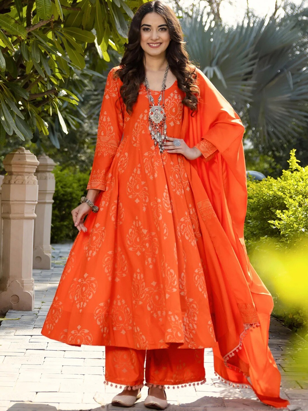 

Rustorange Women Orange Ethnic Motifs Regular Kurta with Palazzos & With Dupatta