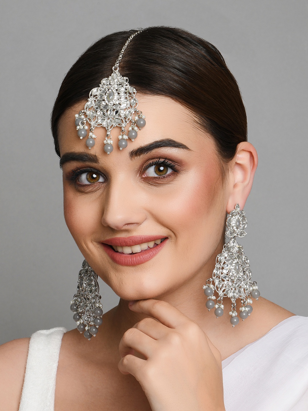 

Fida Silver-Toned Pink & Grey Kundan Stone Studded Jewellery Set