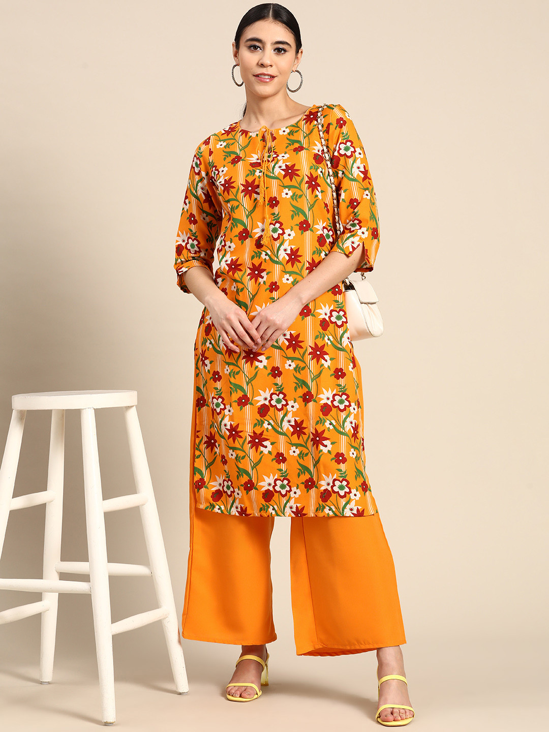 

Anouk Women Floral Printed Tie-Up Neck Kurta with Palazzos, Mustard
