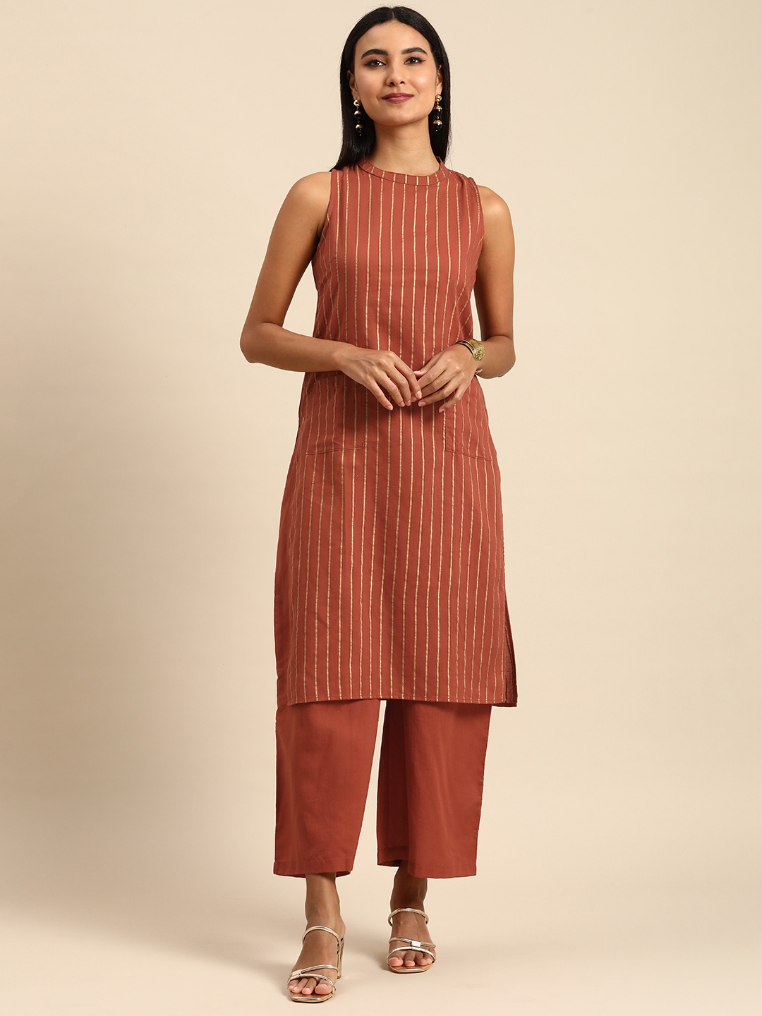 

Anouk Women Rust Striped Kurta with Solid Palazzos