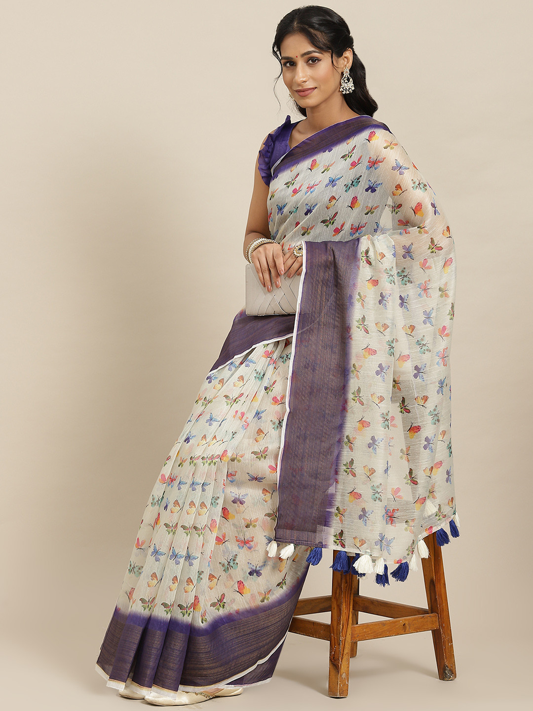 

Mitera Beige with tinge of cream & Blue Linen Blend Butterfly Block Print Saree