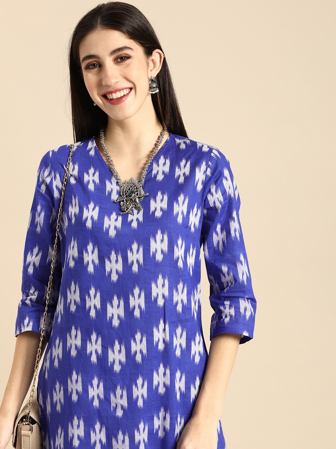 

Anouk Women Blue & White Ikat Printed V-Neck Pure Cotton A-Line Kurta