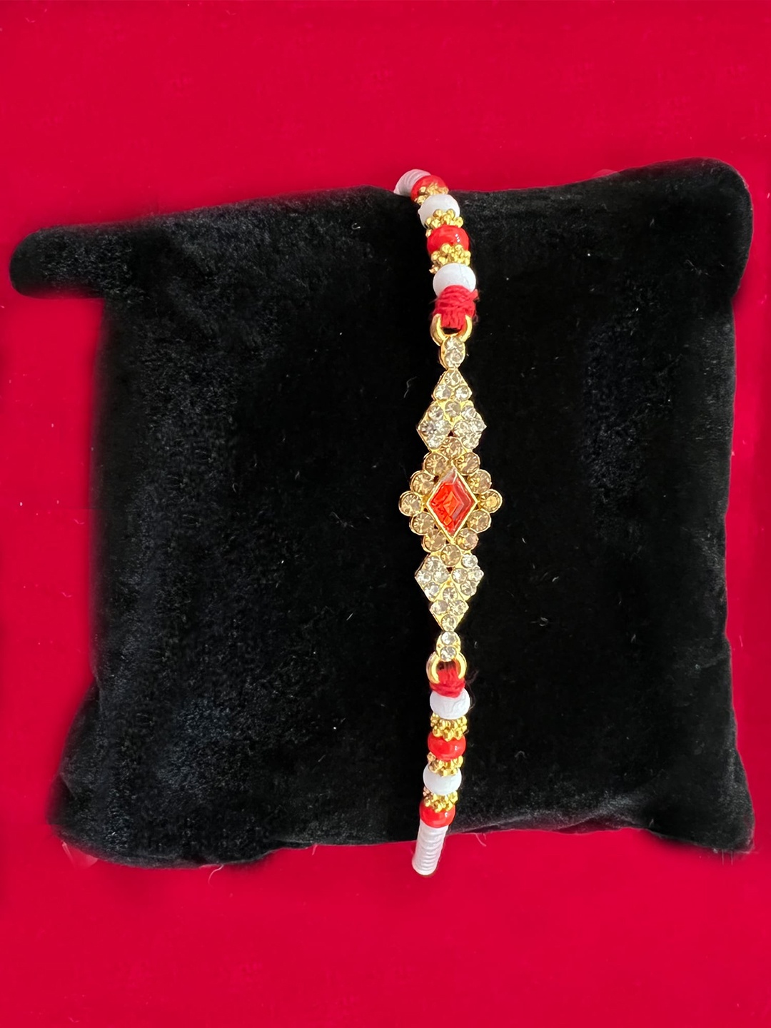 

Vembley Men Red & Gold-toned Beaded Thread Rakhi