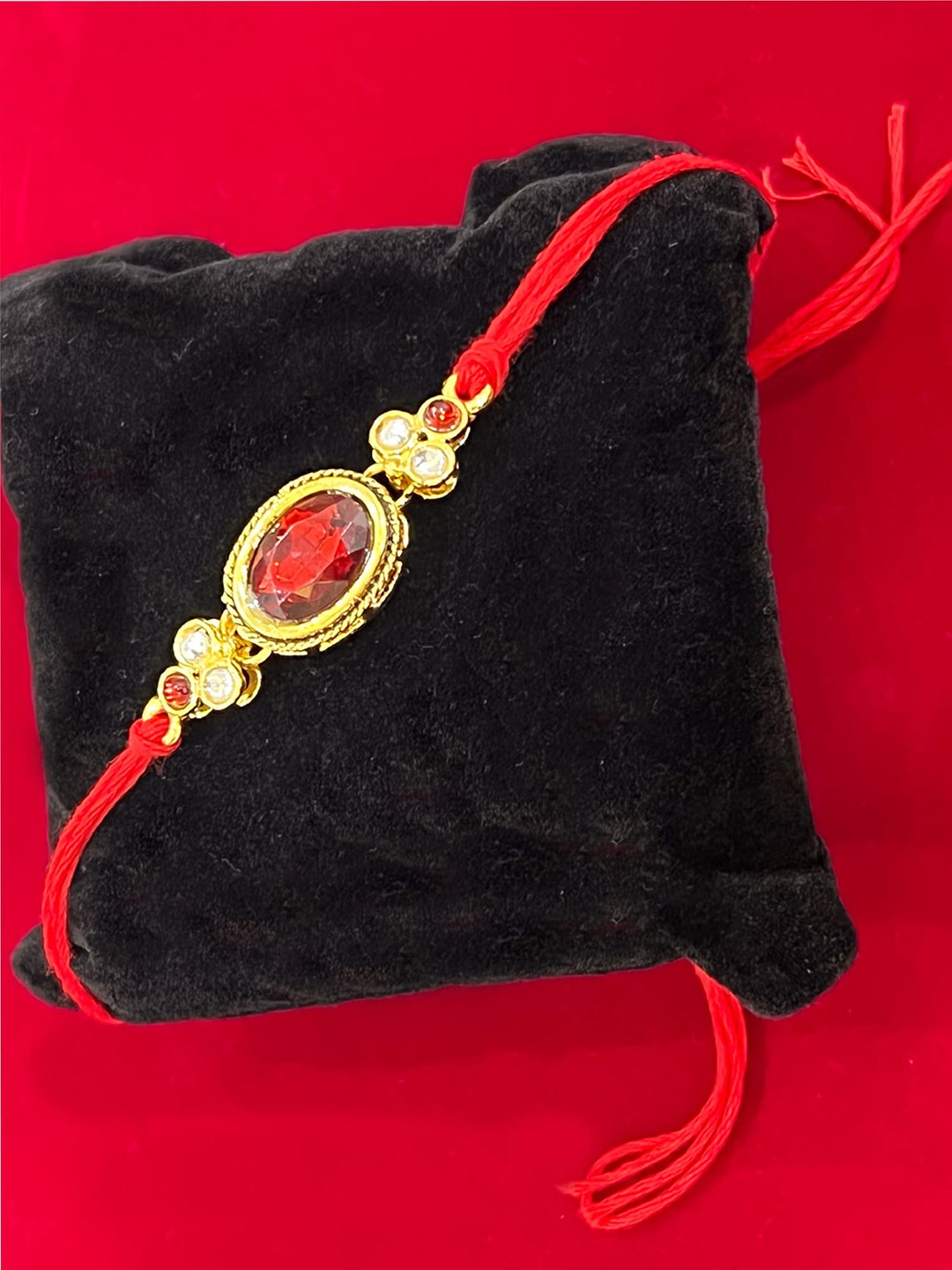 

Vembley Gold-Toned Kundan Beaded Handmade Rakhi