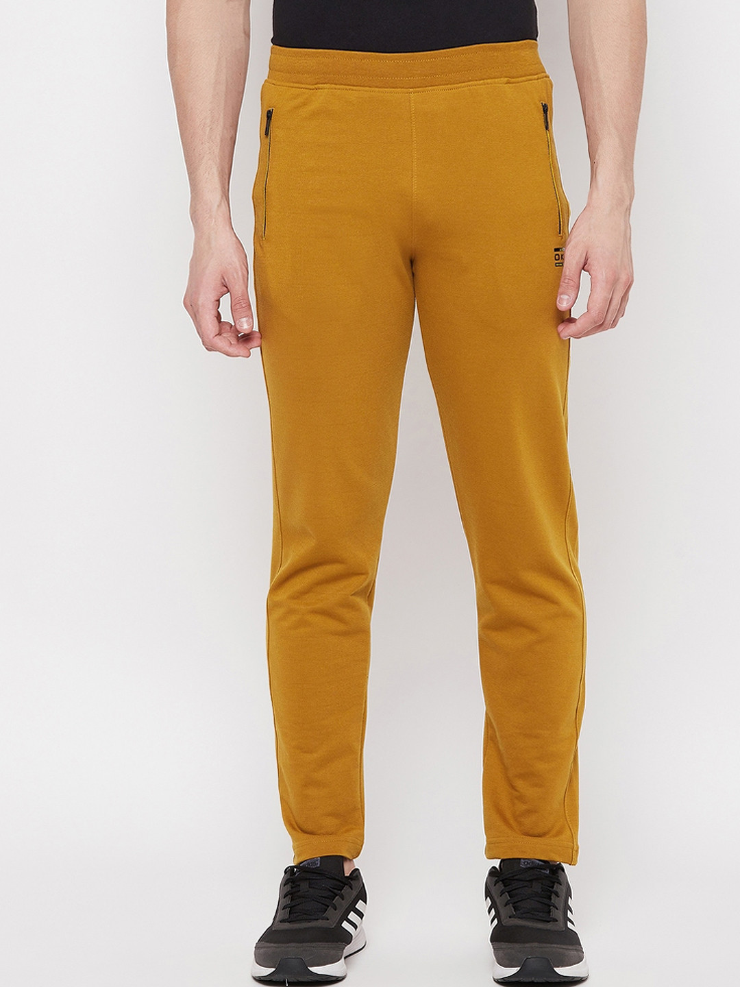 

Okane Men Yellow Solid Track Pants