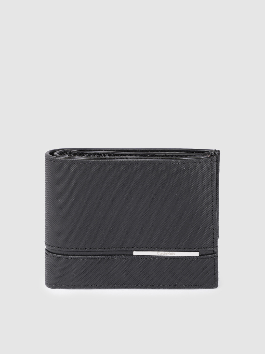 

Calvin Klein Jeans Men Black Textured Leather Two Fold Wallet