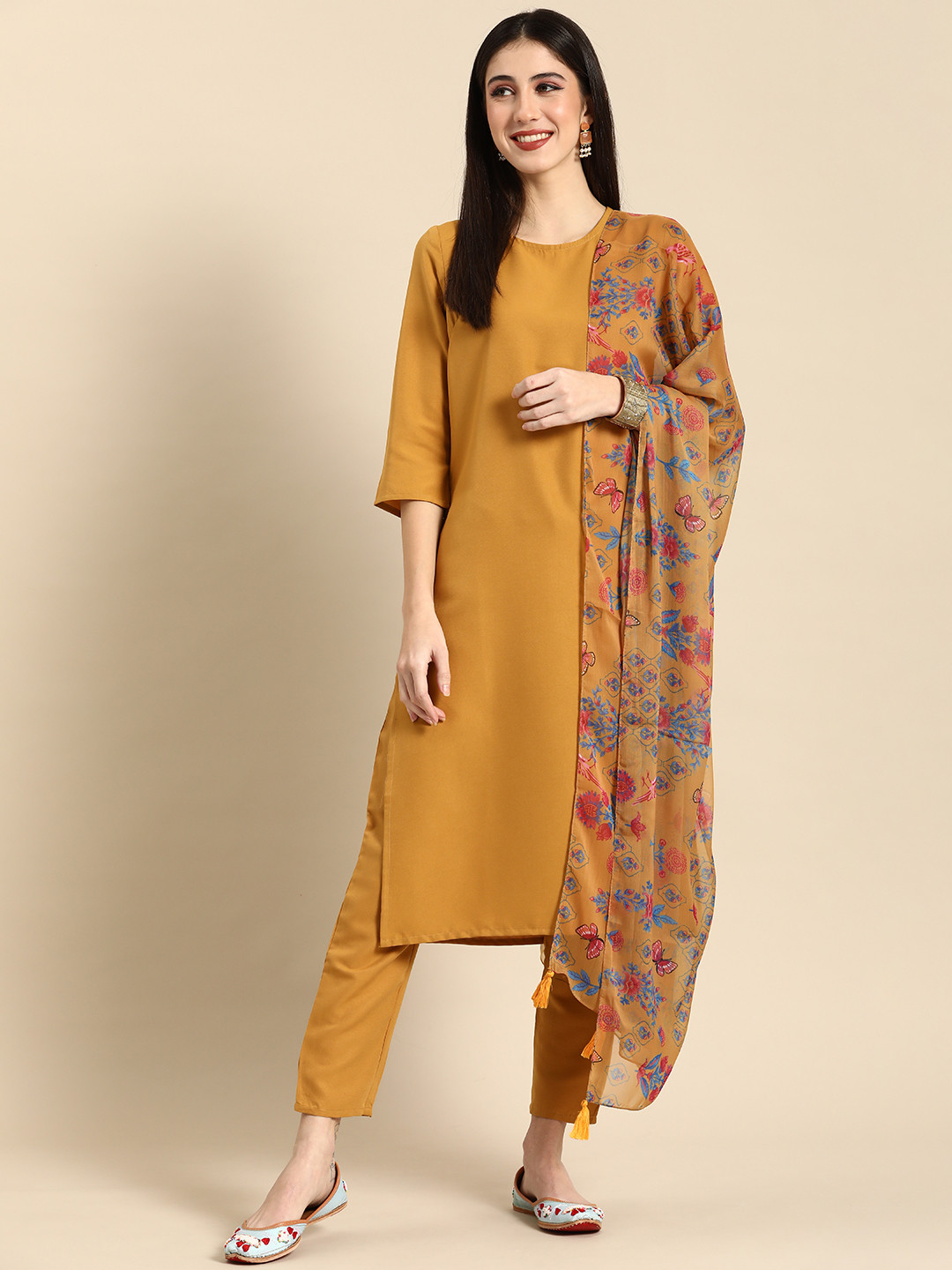

Anouk Women Solid Straight Kurta with Trousers & Dupatta, Mustard