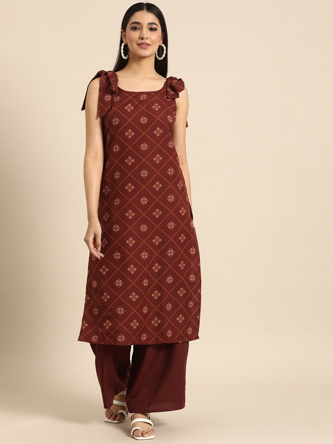 

Anouk Women Rust Red & Yellow Geometric Printed Kurta with Solid Palazzos