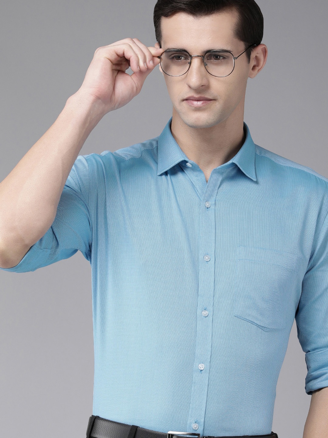 

Park Avenue Men Blue Solid Pure Cotton Slim Fit Formal Shirt