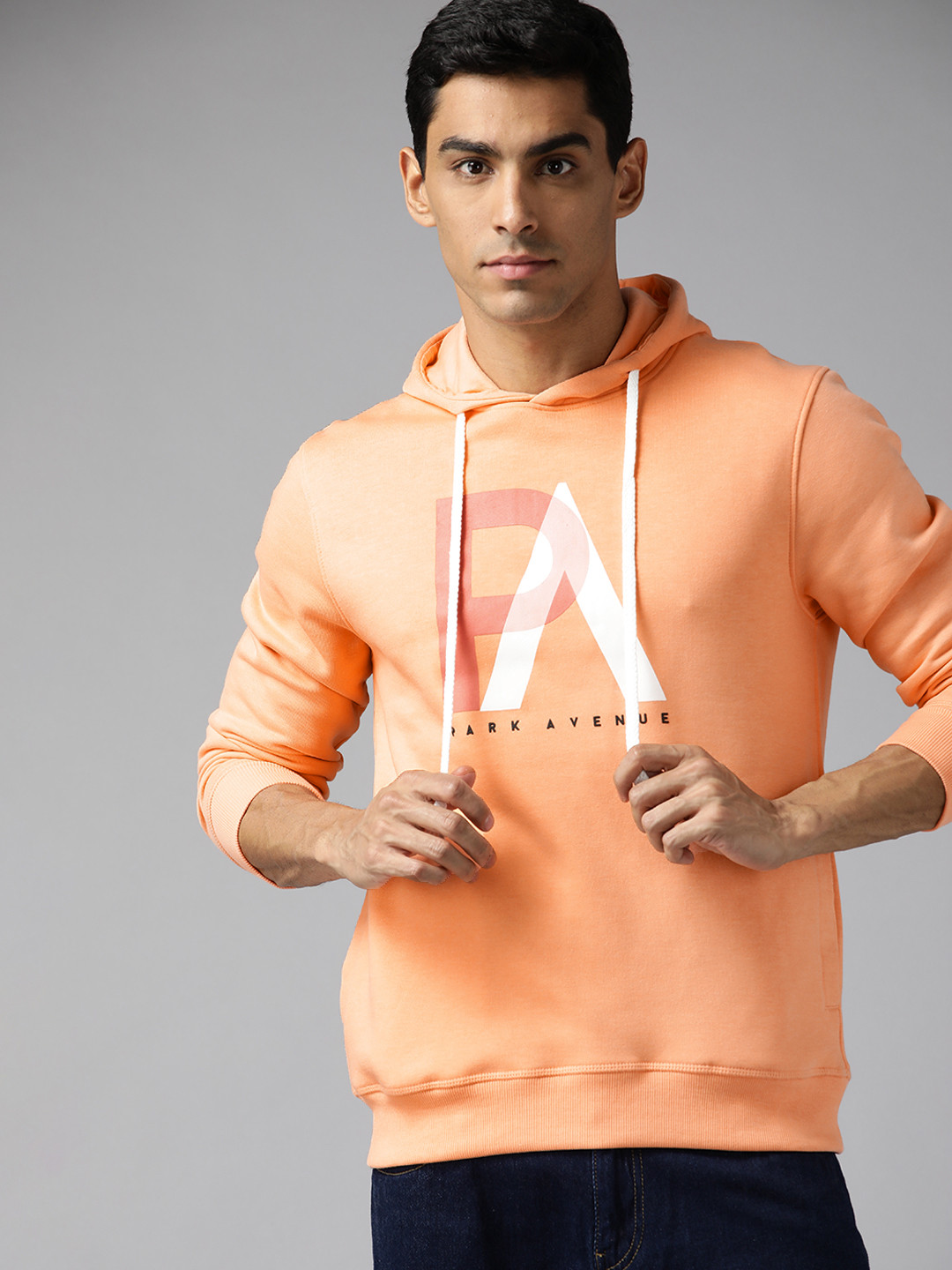 

Park Avenue Men Orange & White Printed Hooded Sweatshirt